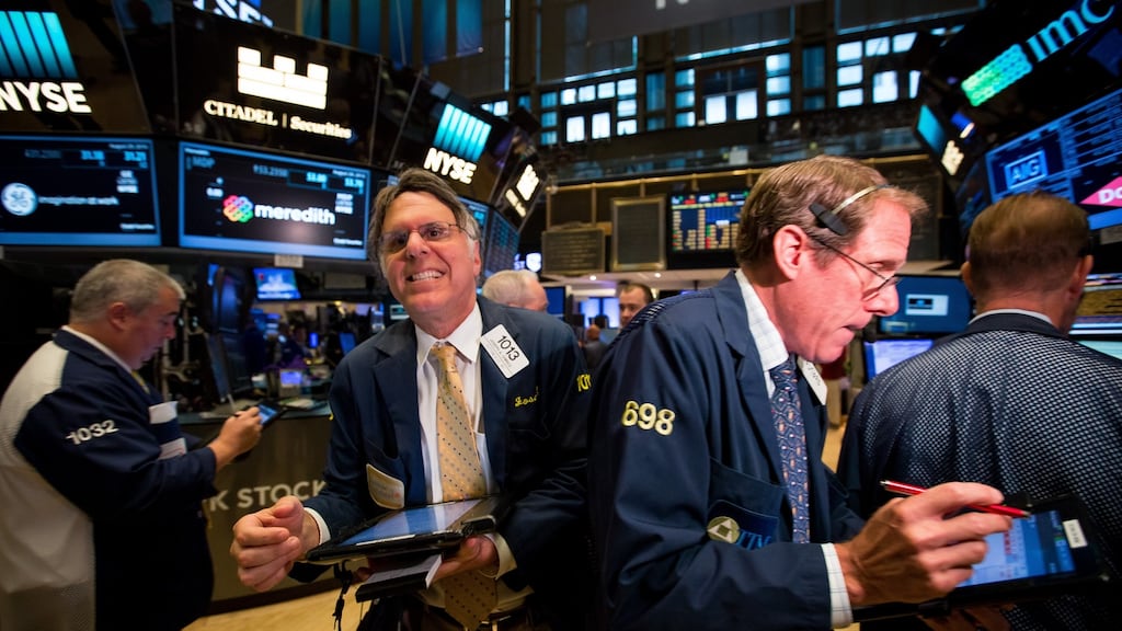 Traders work on the floor of the New York Stock Exchange. Wall Street snapped a three-day losing streak on Monday as financial stocks rose after Federal Reserve chair Janet Yellen said the case for an interest rate hike had strengthened. Photograph: Michael Nagle/Bloomberg
