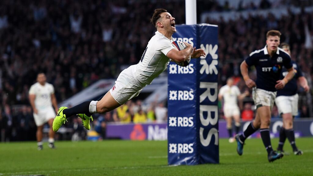 Danny Care  scores England’s  seventh try in the whopping 40-point victory over outclassed Scotland at Twickenham. Photograph: Shaun Botterill/Getty