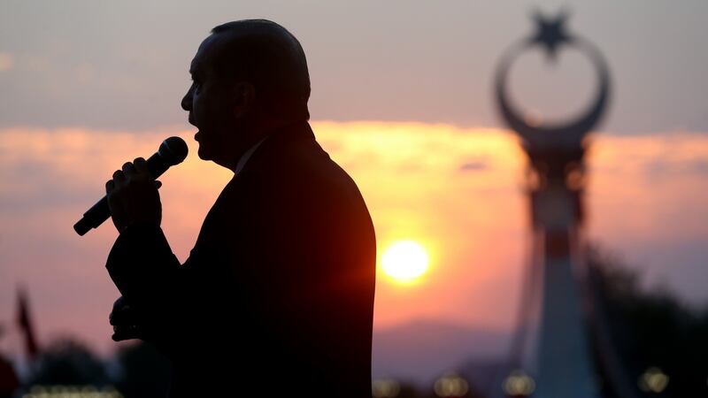 Recep Tayyip Erdogan delivering a speech outside the Presidential Palace in Ankara after a failed coup in July 2016. Photograph: Presidency Press Service via AP