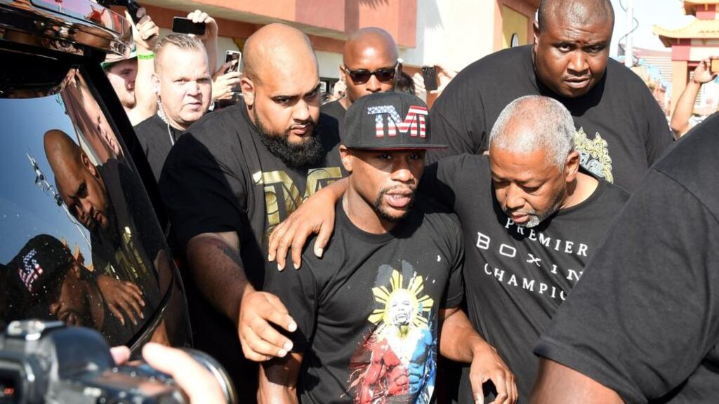 An ESPN report revisited Floyd Mayweather’s history of domestic abuse. Photograph: Getty