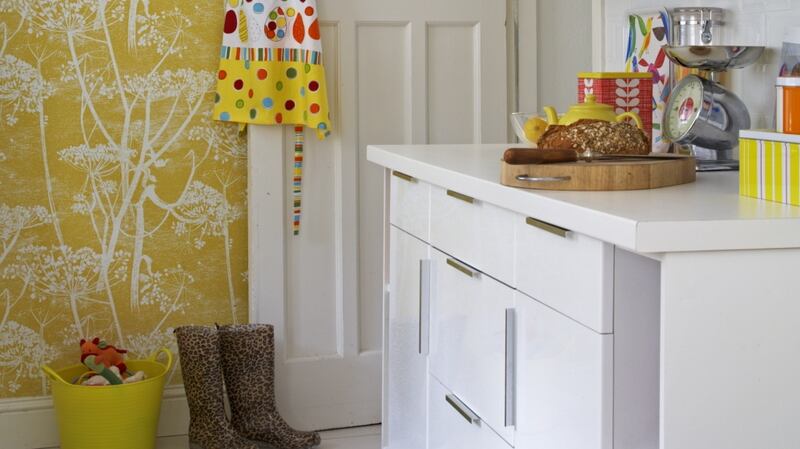 A single wall in Denise O’Connor’s kitchen covered in wallpaper by Cole & Son