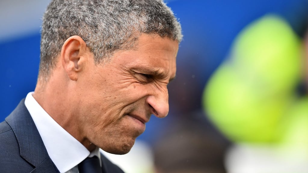 Brighton    manager Chris Hughton: It is simply unfortunate that Hughton, a thoroughly decent man and a fine manager, becomes collateral damage now. Photograph:  Glyn Kirk/AFP