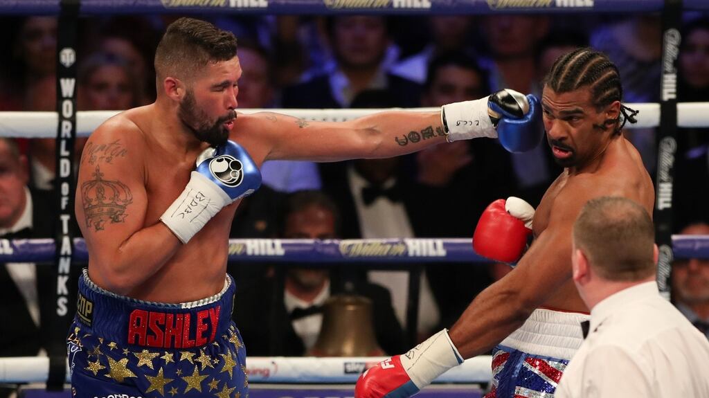 Tony Bellew delivers a straight left against David Haye at the O2 Arena in London. Photograph: Getty Images