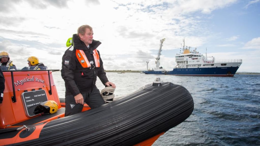Taoiseach Enda Kenny on a Coast Guard vessel off Killala, Co Mayo, welcoming the new $300 million transatlantic fibre optic cable as it arrives in Killala, Co Mayo. The cable, owned and operated by Irish company Aqua Comms, will run directly from Mayo to New York. Photograph: Naoise Culhane