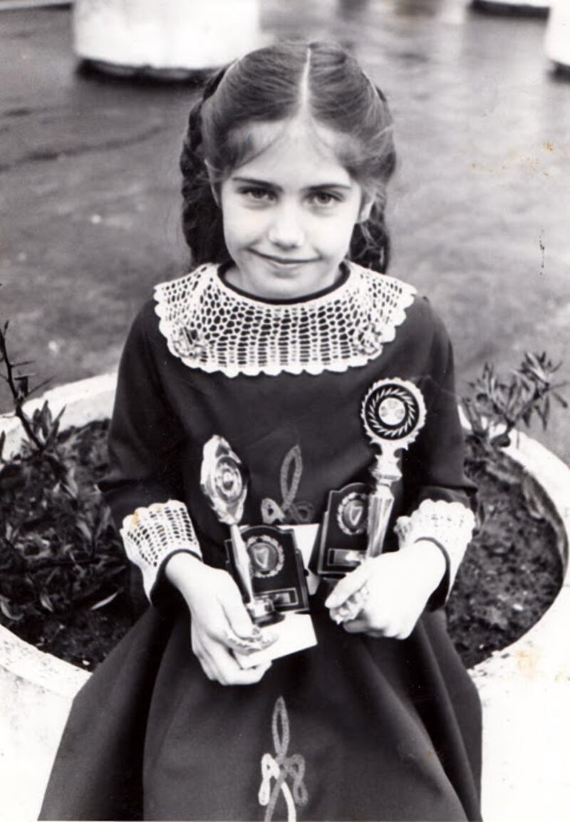 Juliane Mitchell, 8, outside Carrickfergus Townhall at Carrick Festival after winning her first ever trophies for Light Double Jig and Most Promising Dancer