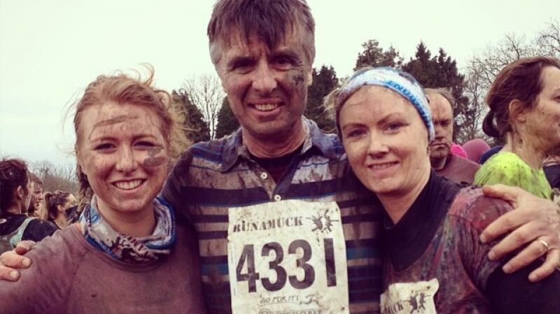 Aisling Brady (26) with her parents Terry and Antoinette. Image: GoFundMe.