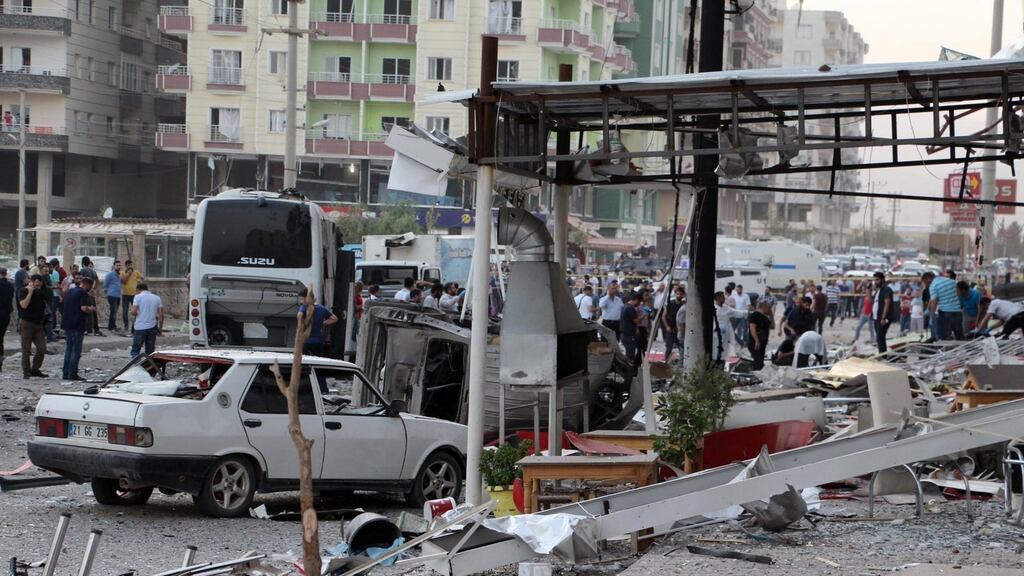 Police search an area after a bomb attack in Mardin, Turkey on Wednesday – half a dozen blasts in Ankara, Istanbul and elsewhere in recent months claimed by separatist Kurdish militants have killed more than 80 people. Photograph: Mehmet Ali Dinler/ DHA via AP