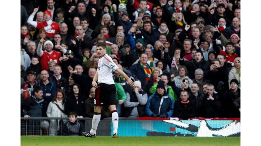 Liverpool's Steven Gerrard leaves the field after being sent off during the FA Cup Third round against Manchester United at Old Trafford (Photograph: Phil Noble/Reuters)
