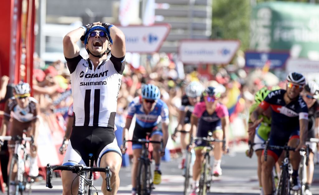 Dan Martin (blue jersey) finishes fifth behind stage winner John Degenkolb of Germany in Cordoba yesterday. photograph: Jose Jordan/Getty