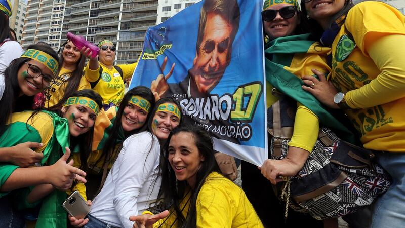 Jair Bolsonaro supporters in Rio. Photograph: Sergio Moraes/Reuters