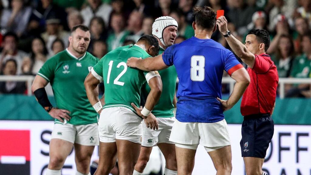 Bundee Aki is consoled by Jack Lam after he is shown a red card during Ireland’s win over Samoa. Photograph: Dan Sheridan/Inpho