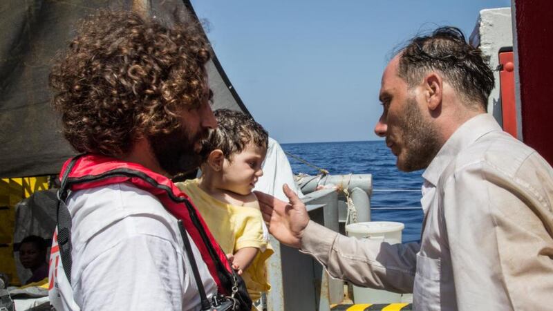 Rescued migrant families describe sea capsize ordeal
