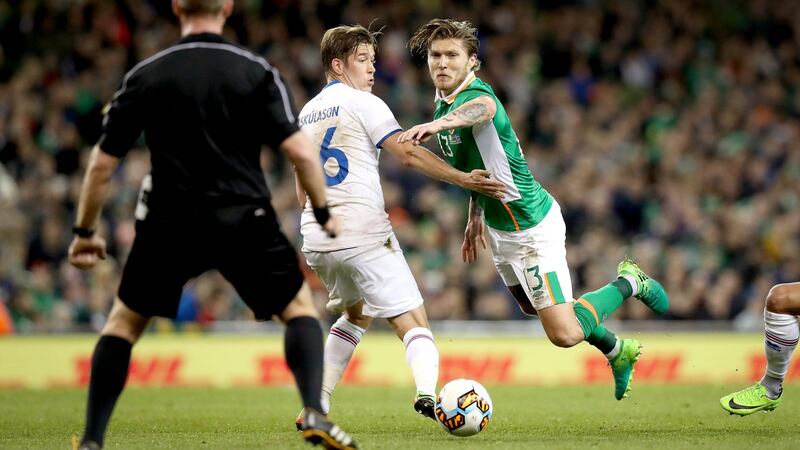Jeff Hendrick goes down under a foul from Olafur Ingi Skulason. Photo: Ryan Byrne/Inpho