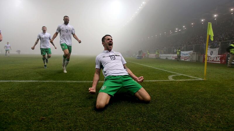 Brady celebrates scoring in the fog of Zenica. Photo: Donall Farmer/Inpho