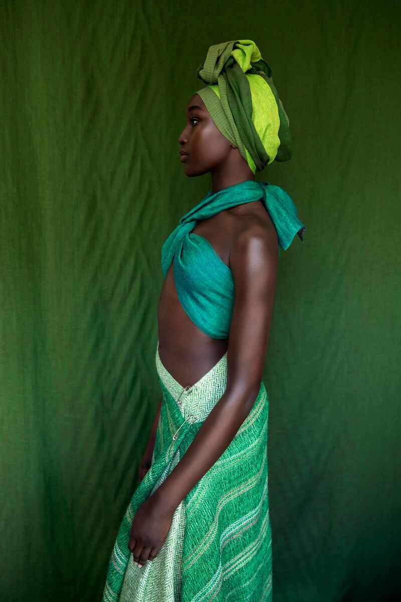 Irish linen scarves in green pinstripe, rich green quince and electric green, handwoven herringbone blanket scarf (€290) with handwoven silk and cotton scarf worn as skirt (€320). Photograph: Barry McCall