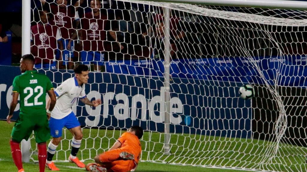 Brazil’s Philippe Coutinho celebrates after scoring against Bolivia during their opening Copa America match. Photo: Miguel Schincariol/Getty Images