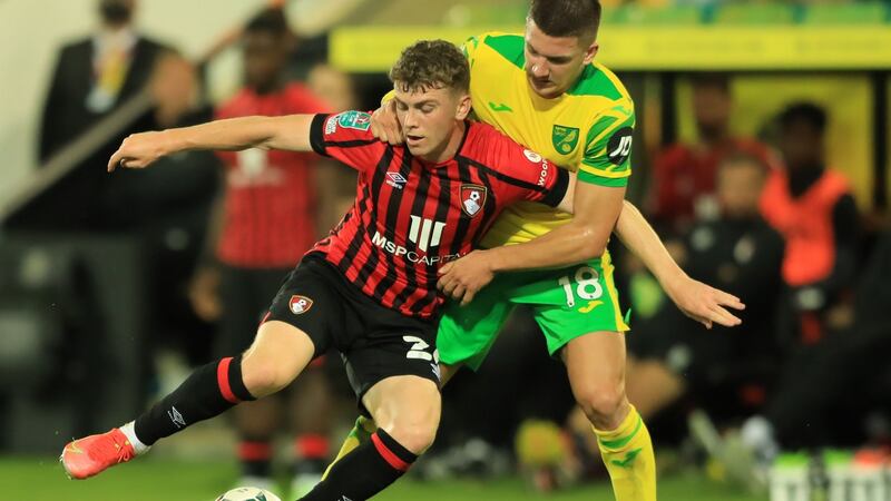 Bournemouth’s Gavin Kilkenny is challenged by  Norwich City’s Christos Tzolis during the Carabao Cup second-round match at Carrow Road. Photograph:  Mark Kerton/PA Wire