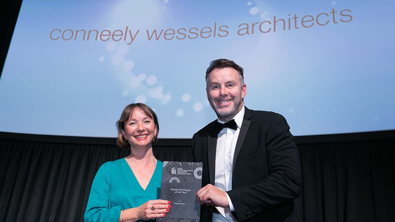 Collette Burns, Awards Judge, presents Residential Project of the Year award to Kevin O'Driscoll, BusinessRiver on behalf Conneely Wessels Architects team.