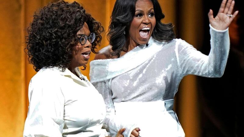 Michelle Obama and Oprah Winfrey in Chicago. Photograph: Jim Young/AFP/Getty Images
