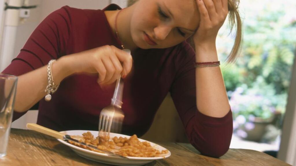 Having a family meal or evening once a week might help encourage communication with your teenage daughter. Photograph: Getty Images