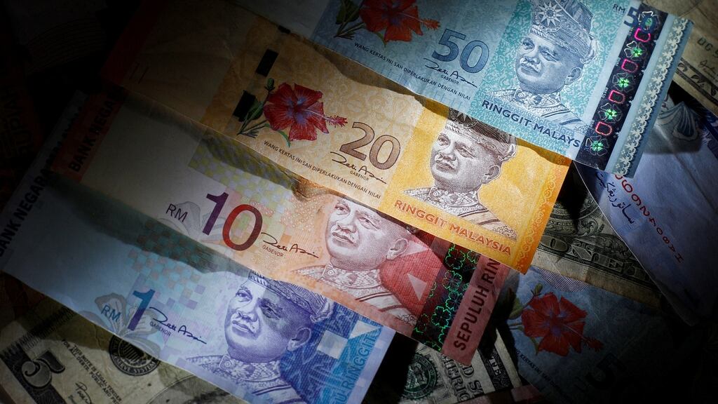 Traders tried to arrange for banks to make high or low submissions to the ABS in relation to the ringgit. Photograph: Edgar Su/Reuters