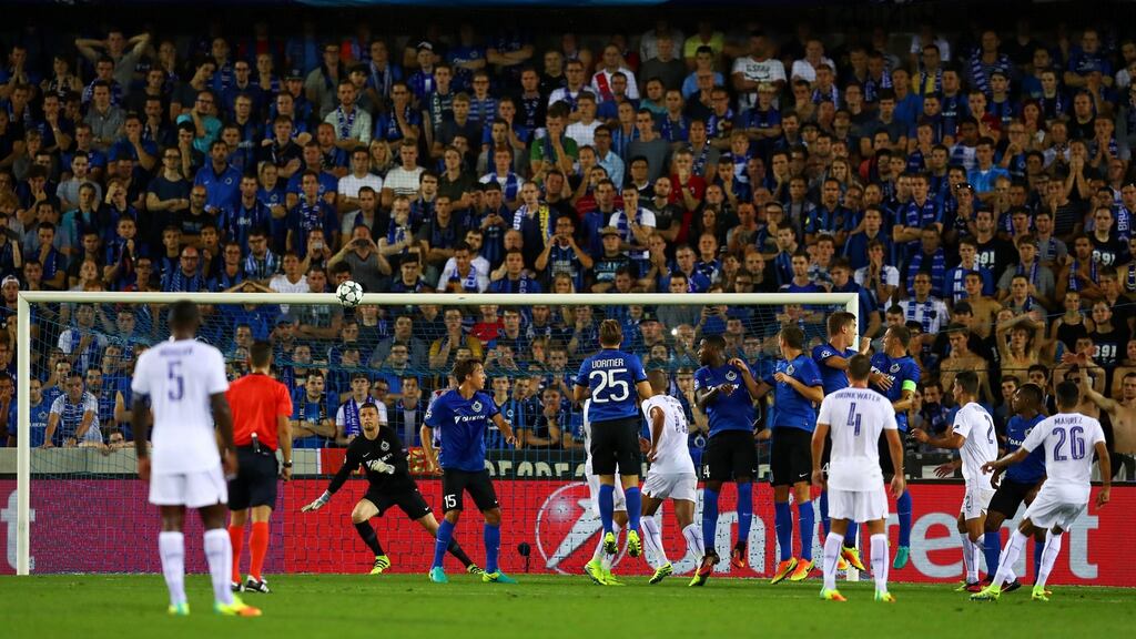 Leicester’s Riyad Mahrez scores a free-kick during their Champions League clash with Club Brugge. Photograph: Dean Mouhtaropoulos/Getty Images