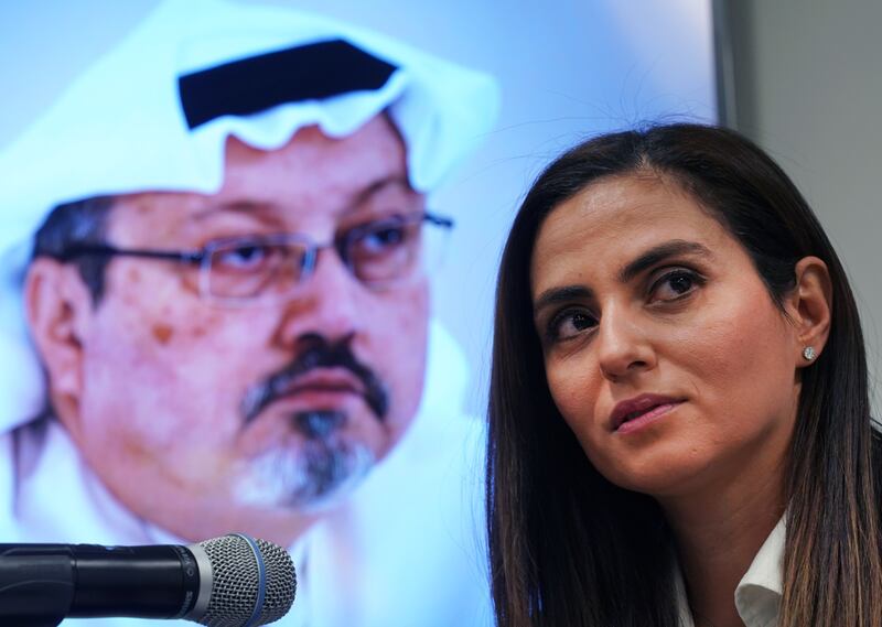 Sherine Tadros, head of the New York (UN) Office of Amnesty International, speaking at a news conference at the UN in October 2018. Saudi journalist Jamal Khashoggi, pictured in background, had been murdered in Turkey that month. Photograph: Timothy A Clary/AFP/Getty