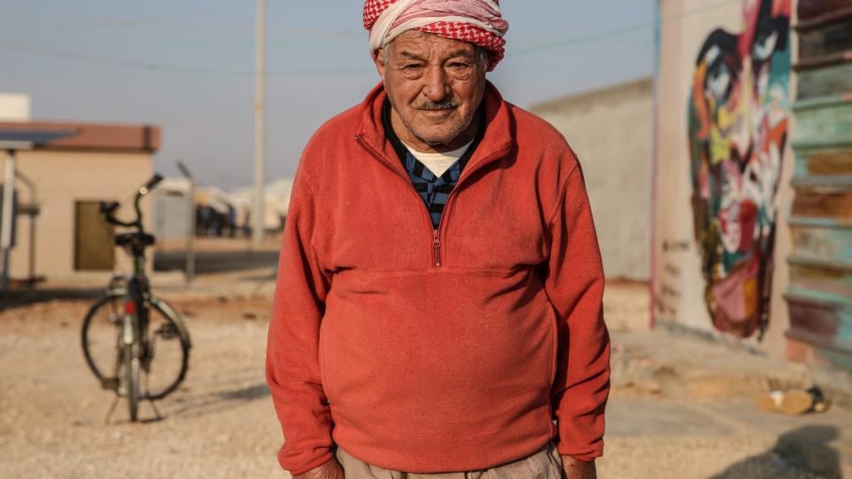An old man poses in Zaatari refugee camp in Jordan, currently home to 80,000 Syrian refugees. Photograph: Sally Hayden
