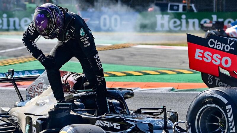Lewis Hamilton gets out of his Mercedes following a collision with Max Verstappen during the Italian Grand Prix at Monza. Photograph: Andrej Isakovic/AFP via Getty Images