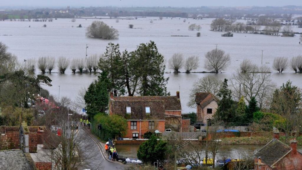 A view south of Burrow Mump near Burrowbridge, Somerset, showing the extensive flooding. Photograph: Neil Munns