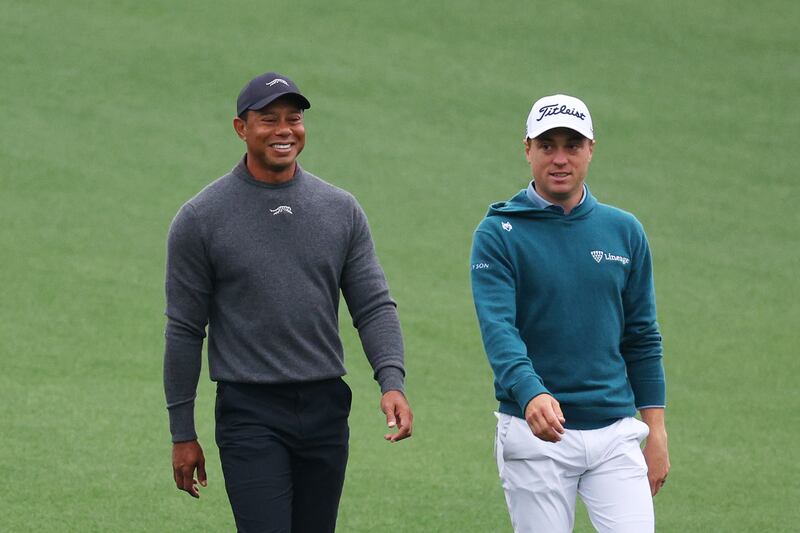 Tiger Woods and Justin Thomas walk down the first fairway during a practice round prior to the 2024 Masters Tournament at Augusta National in Augusta, Georgia. Photograph: Andrew Redington/Getty Images