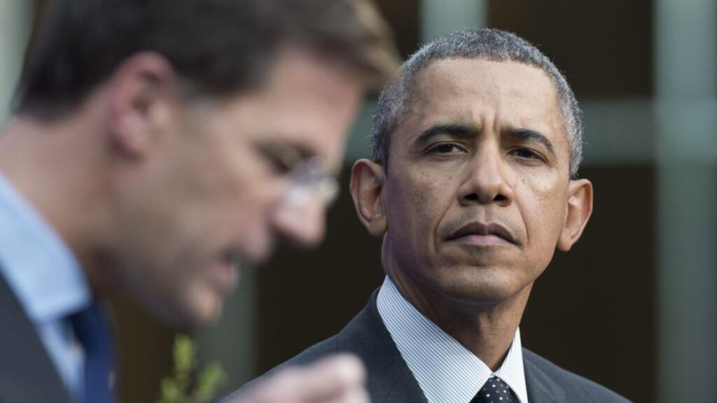 US president Barack Obama looks over at Dutch prime minister Mark Rutte during their joint press conference yesterday. EPA/Toussaint Kluiters