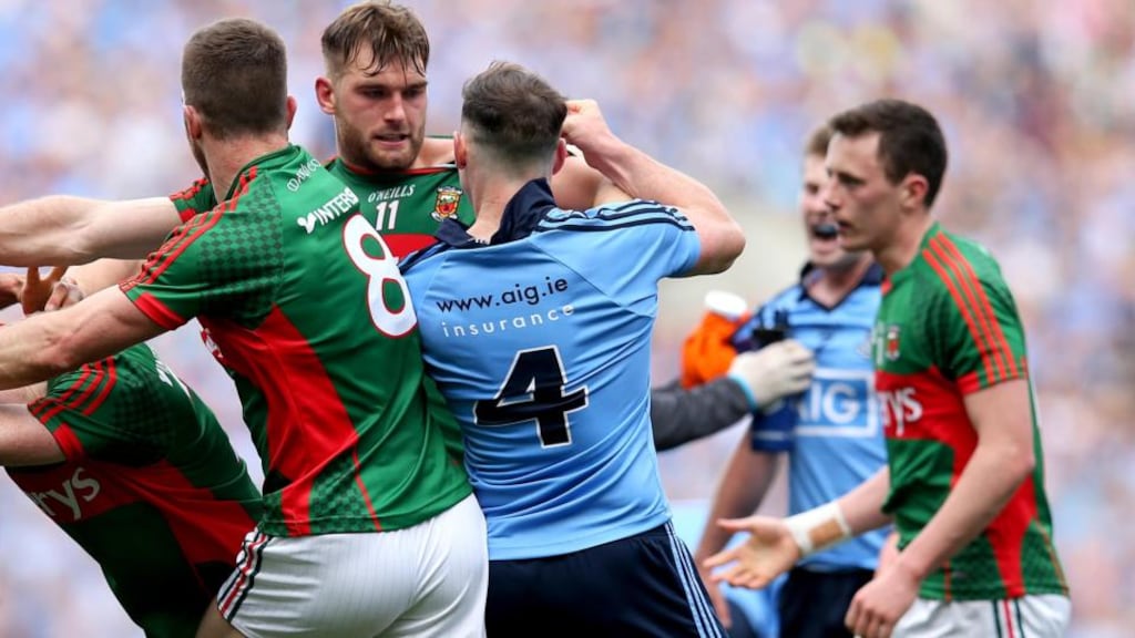 Dublin’s Philly McMahon clashes withMayo’s Aidan O’Shea during an often fraught All-Ireland semi-final at Croke Park. Photograph: Ryan Byrne/Inpho