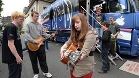 U2-funded children get a chance to record song on board ‘Beatles’ bus