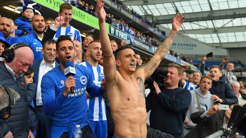 Anthony Knockhaert leads the celebrations after Brighton’s promotion. Photo: Mike Hewitt/Getty Images