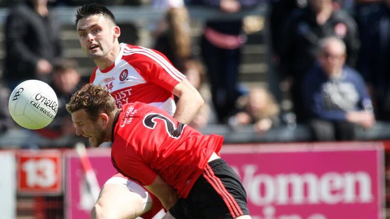 Derry forward Eoin Bradley in action against Down’s Darren O’Hagan during the Ulster SFC quarter-final at Celtic Park. Photo: Lorcan Doherty/Inpho/Presseye