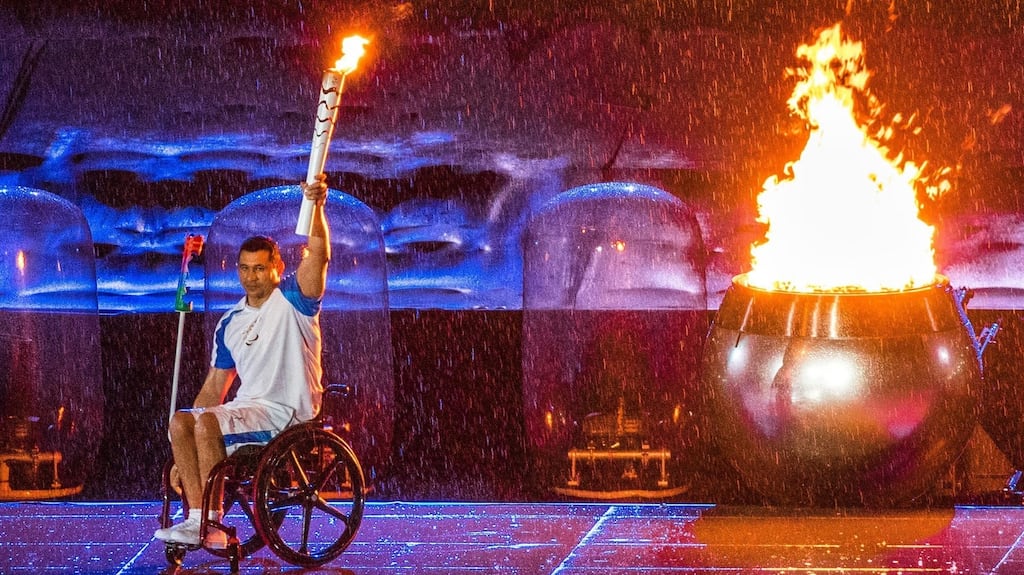 Brazilian Paralympic swimmer Clodoaldo Silva lights the cauldron during the opening ceremony of the Rio 2016 Paralympics Games at the Maracana Stadium in Rio de Janeiro, Brazil. Photograph: EPA/Jens Buttner