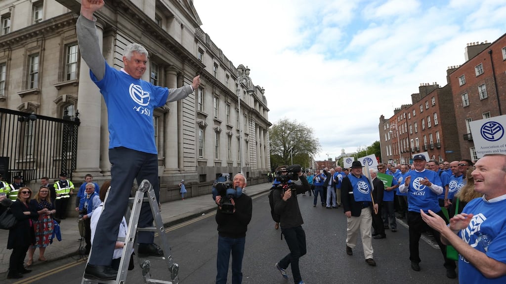 John Jacob, of the Association of Garda Sergeants and Inspectors, adresses a protest by mid-ranking gardaí which called for the restoration of pay. AGSI members have voted decisively to accept the Lansdowne Road agreement on public service pay. Photograph: Colin Keegan/Collins.