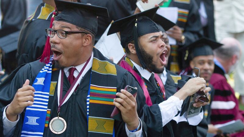Graduates react after hearing billionaire technology investor and philanthropist Robert F Smith will wipe out the student debt of the entire 2019 graduating class at Morehouse College in Atlanta. Photograph: Steve Schaefer/Atlanta Journal-Constitution