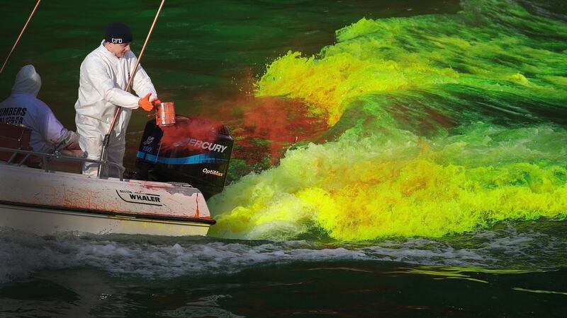 Workers dye the Chicago River green in Chicago, Illinois. Photograph: Scott Olson/Getty Images