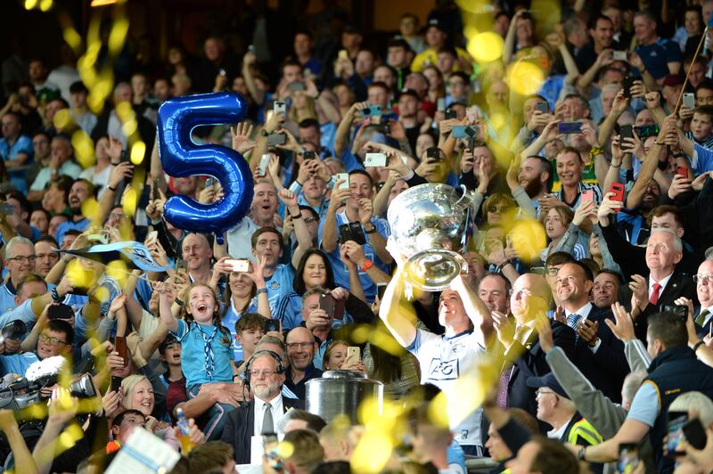 Stephen Cluxton lifts Sam Maguire after Dublin claim a fifth consecutive All-Ireland title. Photograph: Dara Mac Dónaill