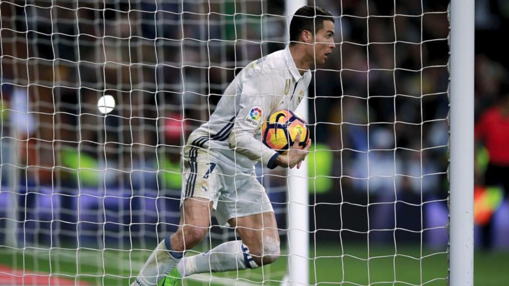 Cristiano Ronaldo scored two late goals to salvage a point for Real Madrid at Las Palmas. Photograph: Gonzalo Arroyo Moreno/Getty