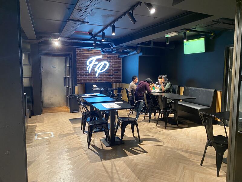 Fat Phill's: The main diningroom channels low-lit industrial