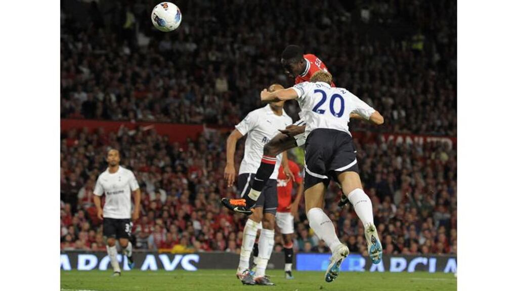 Danny Welbeck heads Manchester United in front at the defending champions strolled pasat Tottenham at Old Trafford. Photograph: Nigel Roddis/Reuters