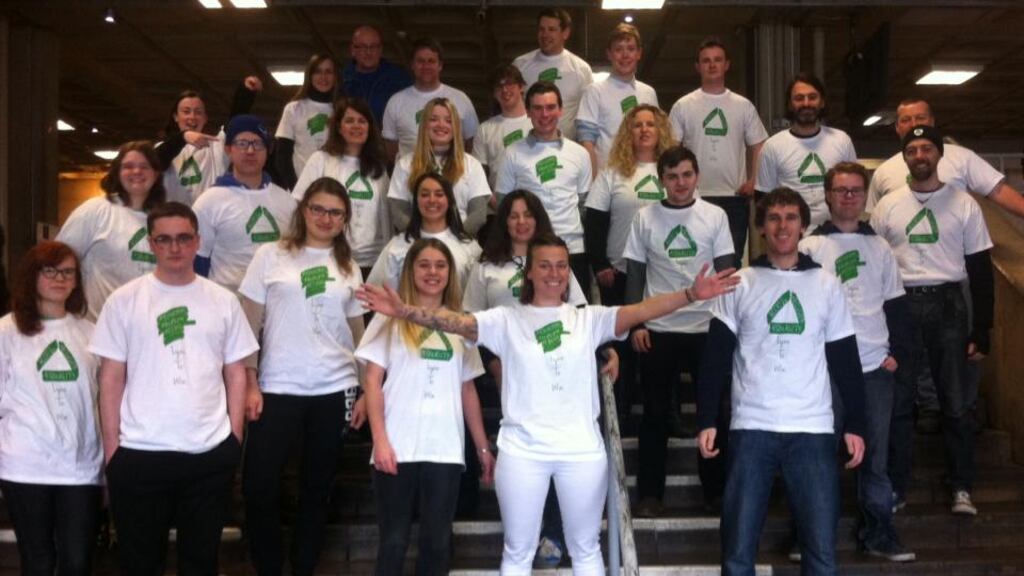 Lynn Ruane (centre, with arms wide) with some of her campaign team.