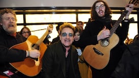 Bono and Hozier take to Grafton Street for Christmas Eve busk