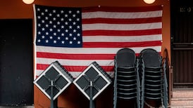 US jobless claims ease as economy struggles to reopen