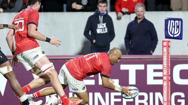 Simon Zebo dives to score on his Munster return against the Sharks. Photograph: Laszlo Geczo/Inpho