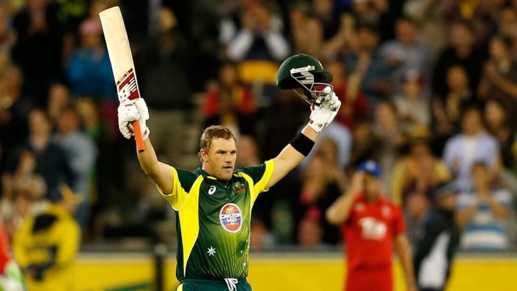 Australia’s Aaron Finch celebrates a century during the opening one-day international series between Australia and England at Melbourne Cricket Ground yesterday. Photograph: Darrian Traynor/Getty Images