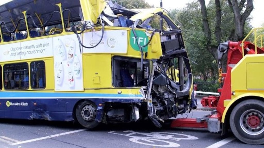 A file picture of the Dublin Bus vehicle being towed away from the scene after the crash. Photograph: Bryan O’Brien